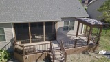 Trex deck, railing ,bench with screen porch and covered grill area