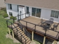 Multi colored Trex deck with cable railing