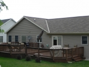 Low deck in the backyard one story house