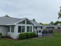 Trex deck and railing with custom sunroom